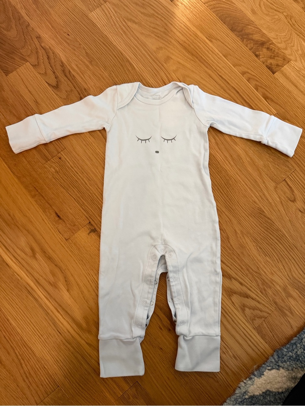 Soft light blue Baby One-Piece Romper with Sleepy Face